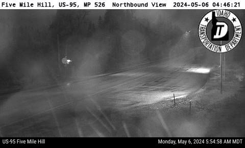 Webcam showing US 95 at 5 Mile Hill, 16 miles from Canadian Border